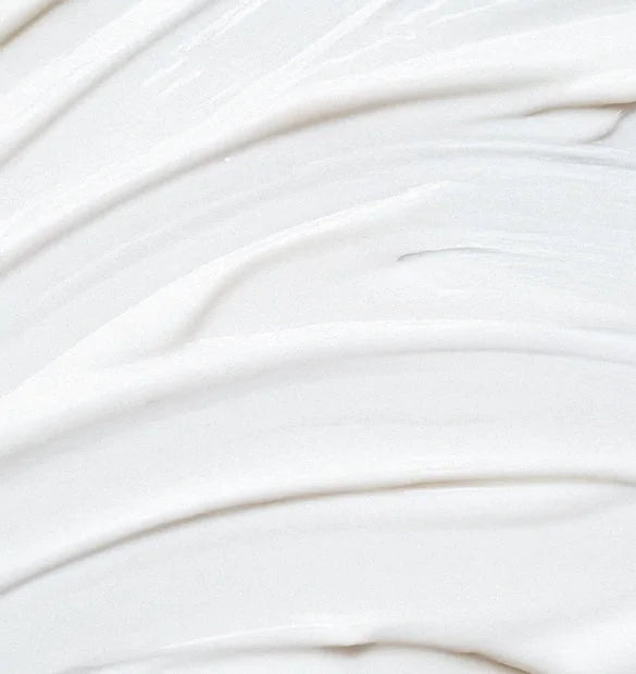 Visuel texture blanche creme mains seches Cattier